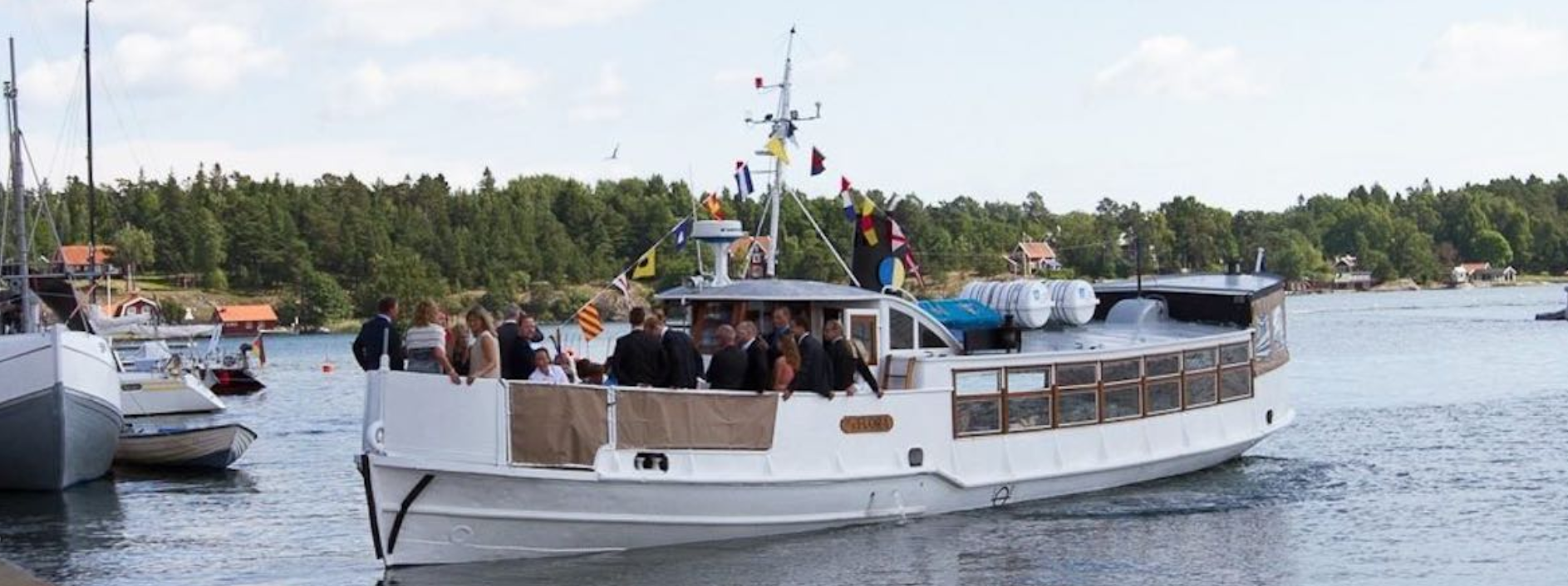 Kryssa i Skärgården med M/S Flora logotyp