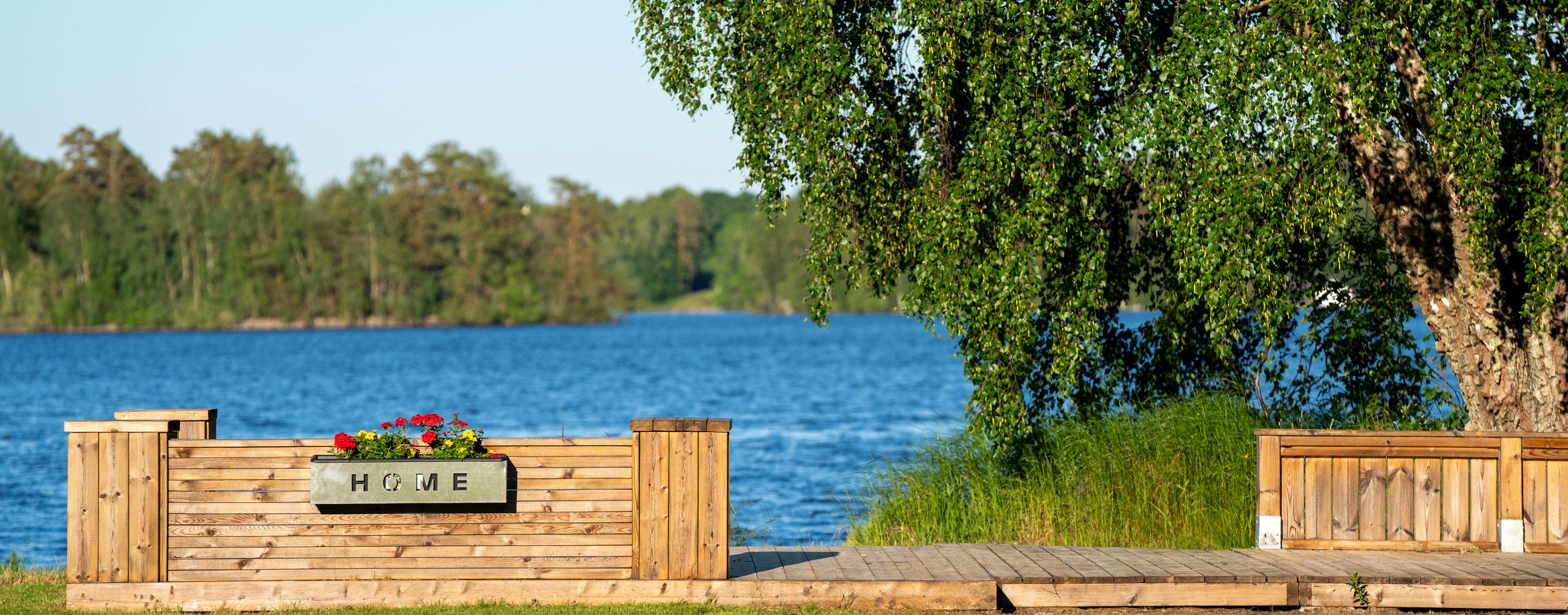 Naturskön camping med sjöutsikt men ändå nära stadslivet